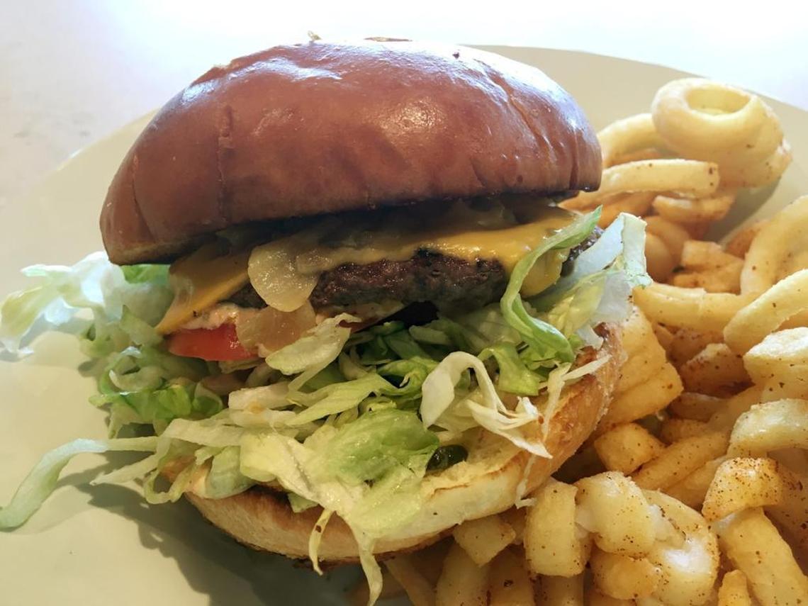The quarter-pound Black Angus cheeseburger at Wooly’s in Pismo Beach.