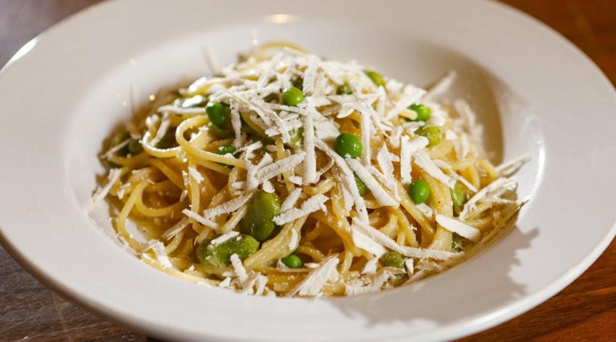 A summer pasta dish at Il Cortile Ristorante in Paso Robles features spaghetti, peas and fava beans.