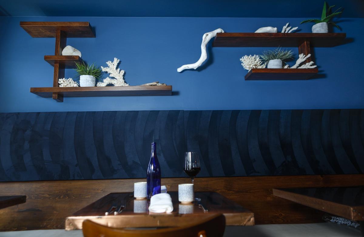 Blue Heron restaurant in Baywood Park evokes a modern nautical theme with rich aquamarine walls and copper-topped tables.