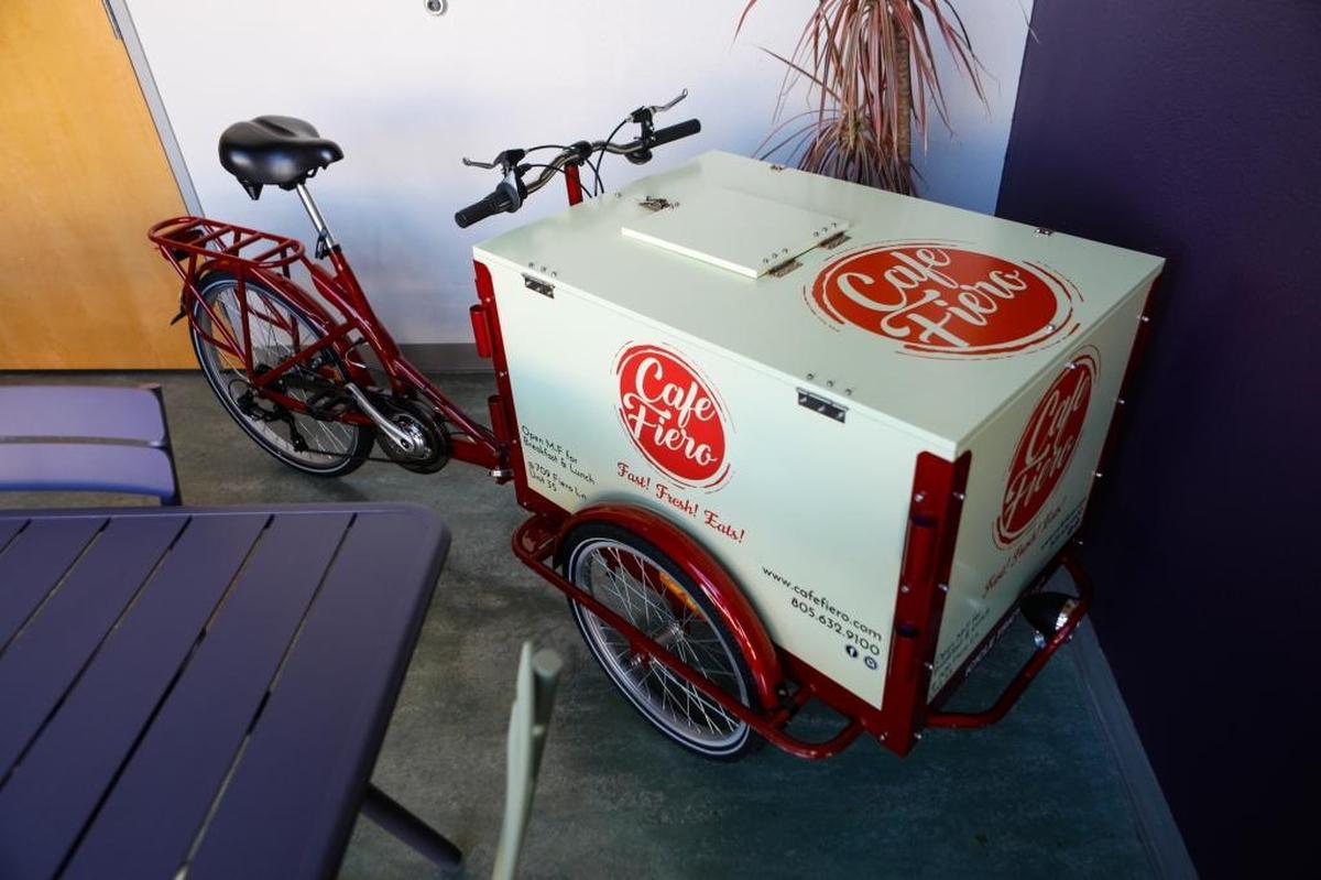 San Luis Obispo’s Café Fiero uses a bicycle to deliver online orders to individuals and special orders to neighboring businesses.