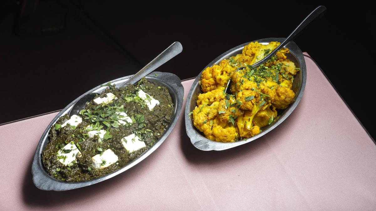 Vegetarian options at Taj Palace in San Luis Obispo include palak paneer, featuring spinach cooked in herbs with homemade cheese, and aloo gobi, featuring cauliflower and potatoes cooked with herbs and spices.