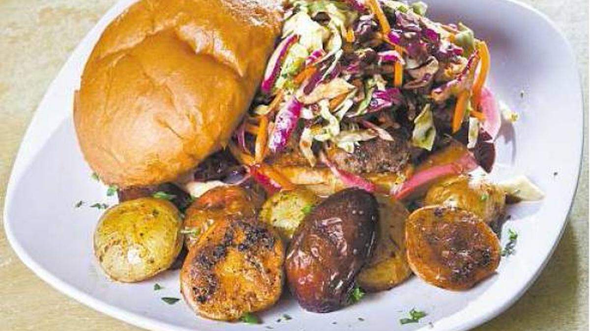 The Dragon Lady Burger comes with roasted potatoes at House of JuJu in Morro Bay..
