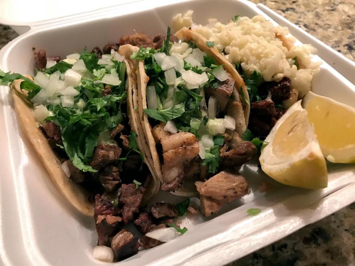 A trio of tacos from Garcia’s in Atascadero includes, from left, carne asada, carnitas and beef colorado.