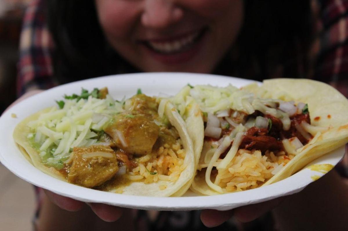 Pollo colorado and pollo verde tacos share the plate at Tacos de Acapulco in Grover Beach.