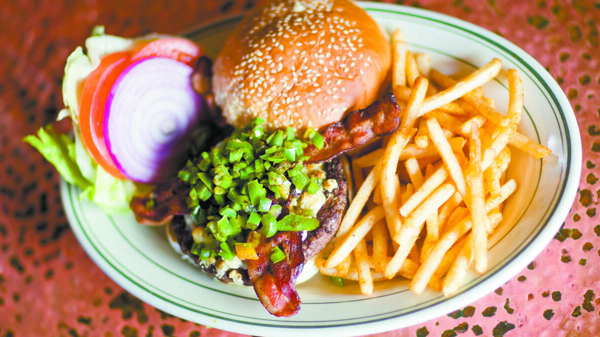 The Jalapeño Black and Blue Burger at Black Sheep Bar and Grill in San Luis Obispo is topped with grilled fresh jalapeños, crumbled blue cheese and applewood smoked bacon.