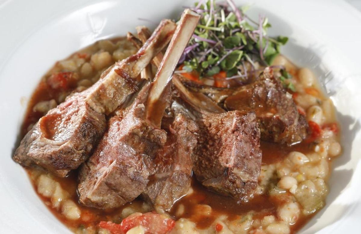 A rack of lamb is served with cannellini beans at Blue Moon Over Avila in Avila Beach.