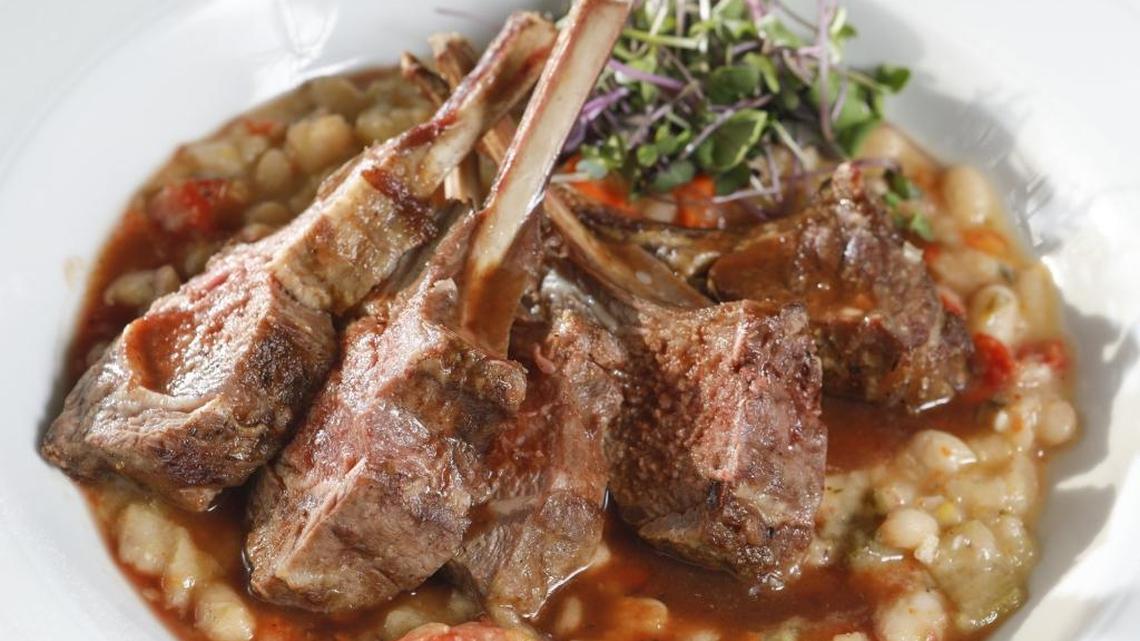 A rack of lamb is served with cannellini beans at Blue Moon Over Avila in Avila Beach.