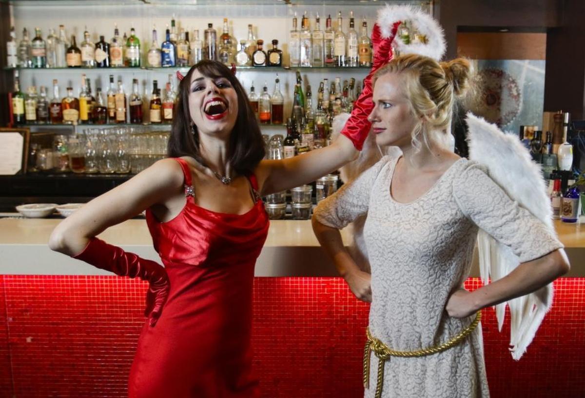Tribune entertainment editor Sarah Linn, left, bedevils a former Tribune staff member, angelic Danielle Ames.