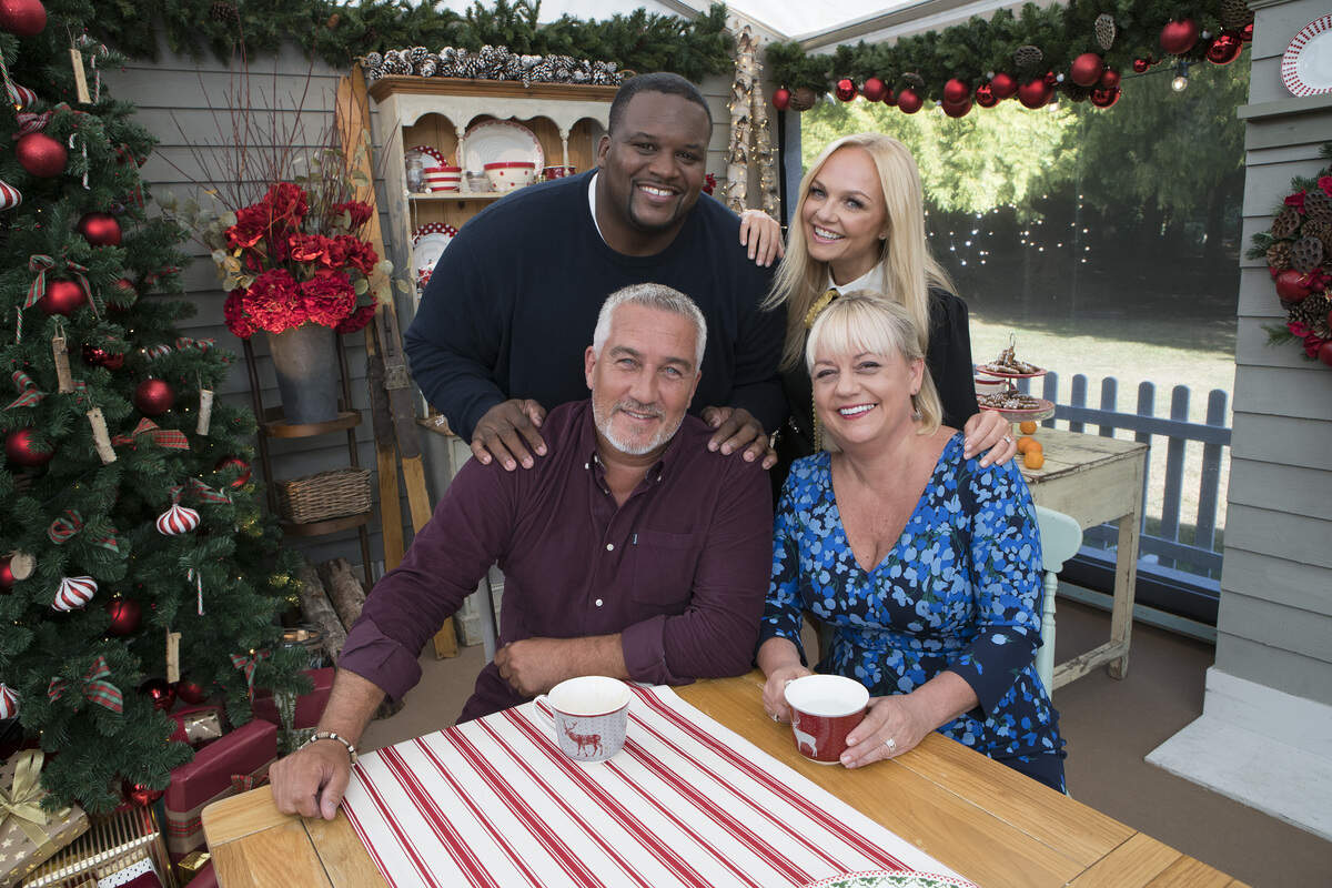 “The Great American Baking Show: Holiday Edition,” based on the hit U.K. series “The Great British Bake Off,” returns Thursday, Dec. 6, to ABC. Pictured are hosts Anthony “Spice” Adams and Emma Bunton, standing, and judges Paul Hollywood and Sherry Yard.