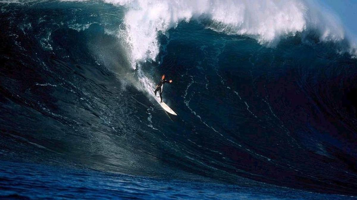 Surfer Chris Bertish, seen riding a wave off the coast of Todos Santos, Mexico, set out from Half Moon Bay in California last week to trek to Hawaii alone in a boat but had his trip cut short after an electronics issue.