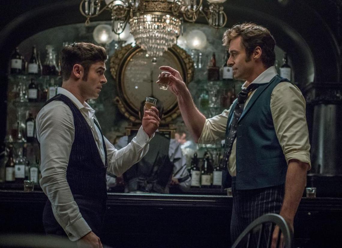 P.T. Barnum (Hugh Jackman) and Philip Carlisle (Zac Efron) appear in a scene from “The Greatest Showman.”