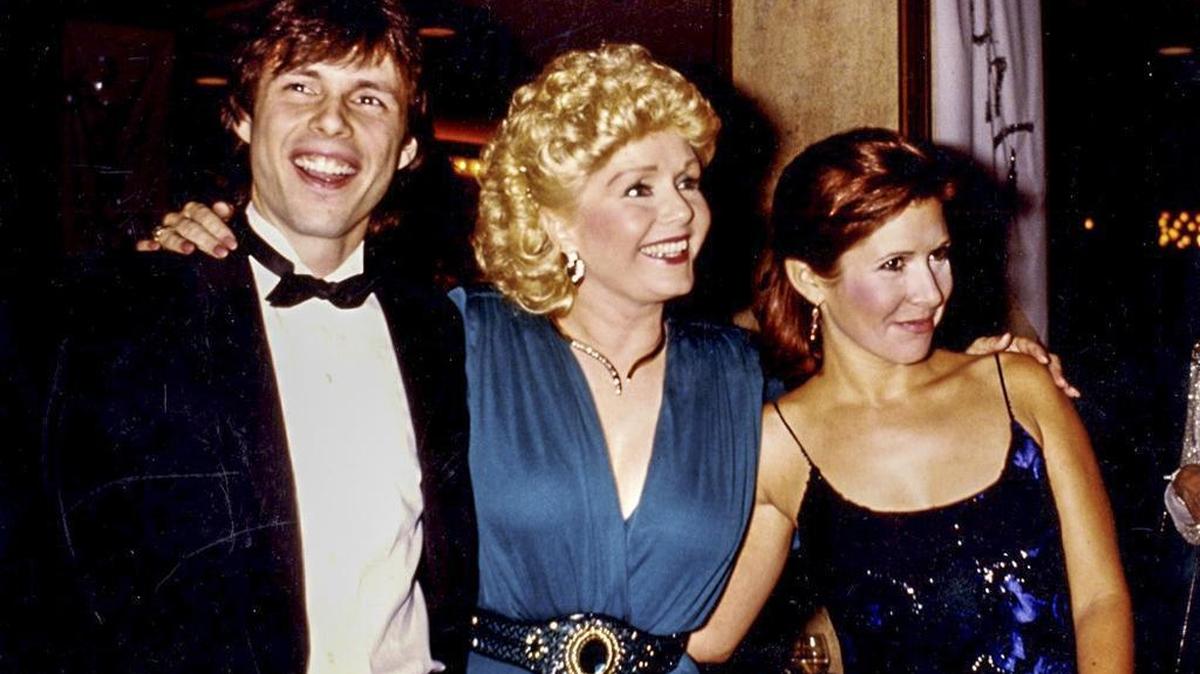 Todd Fisher, Debbie Reynolds and Carrie Fisher pose for a picture. The Fisher family is featured in the HBO documentary “Bright Lights: Starring Carrie Fisher and Debbie Reynolds,” screening March 15 as part of the San Luis Obispo International Film Festival.