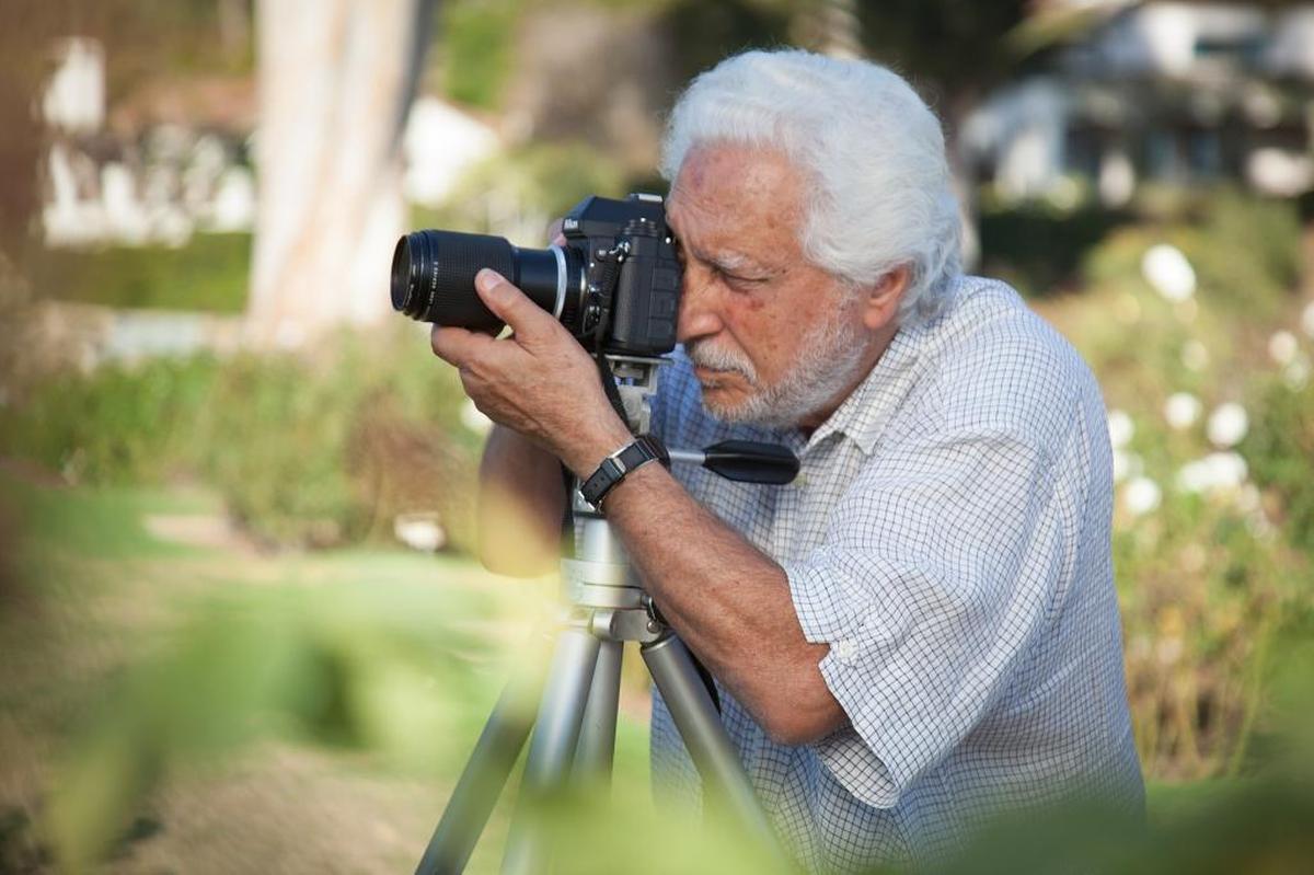 Santa Barbara photographer Santi Visalli appears in the documentary “Lives Well Lived: Celebrating the Secrets, Wit & Wisdom of Age,” which begins its theatrical run Friday at the Palm Theatre in San Luis Obispo.
