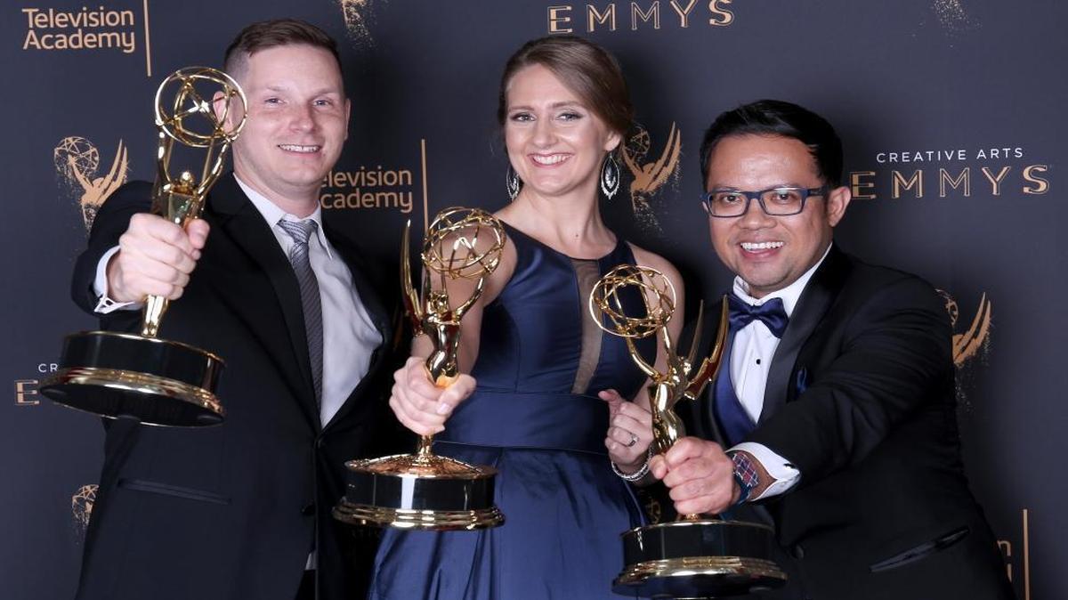 John Roha, from left, Jamie Martin, and John Lim pose for a portrait with their awards for outstanding picture editing for a structured or competition reality program for “RuPaul’s Drag Race” on Saturday during the Creative Arts Emmy Awards at the Microsoft Theater in Los Angeles.