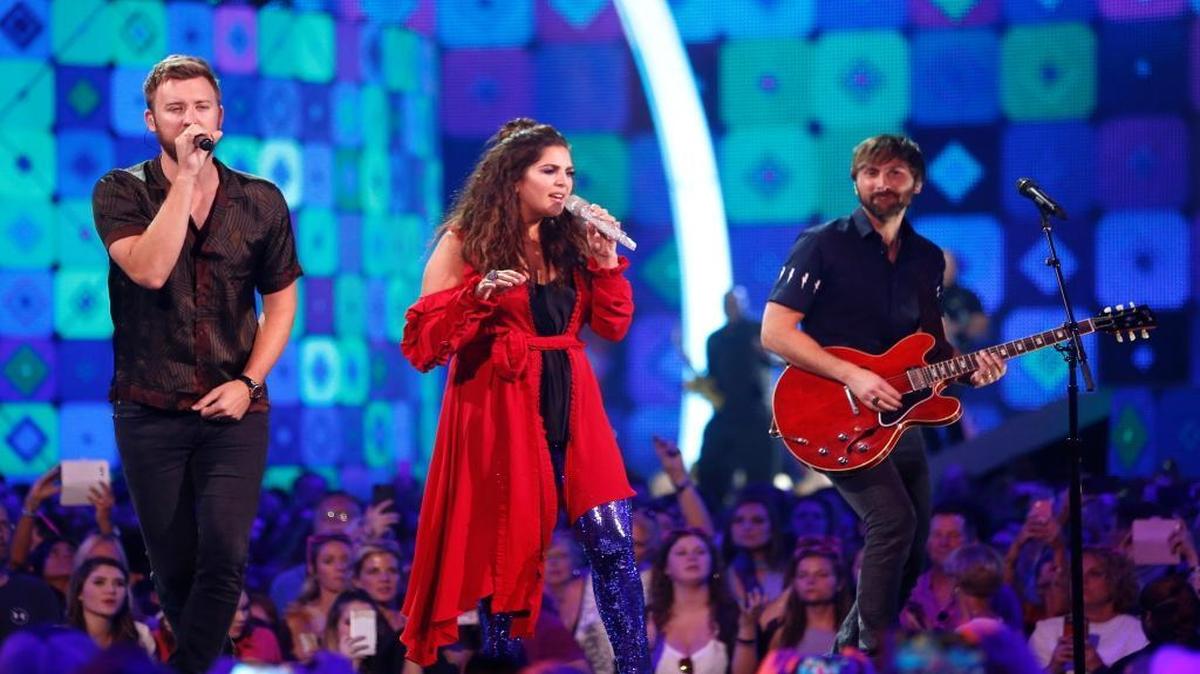 Charles Kelley, from left, Hillary Scott and Dave Haywood of Lady Antebellum perform at the CMT Music Awards in June in Nashville, Tennessee. The country band filmed the promotional video for its album “Heart Break Hotel” at the Madonna Inn in San Luis Obispo in May.