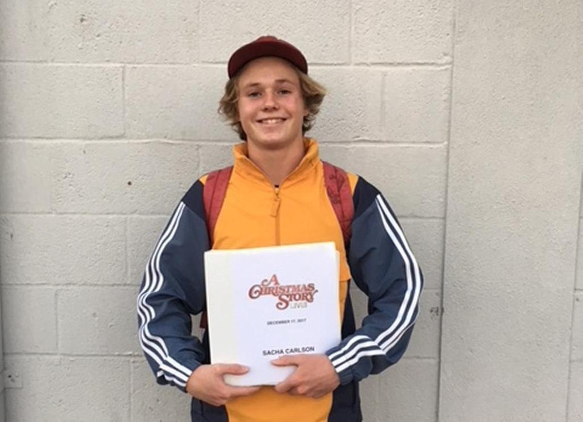 San Luis Obispo resident Sacha Carlson poses with his script for Fox’s “A Christmas Story Live!”