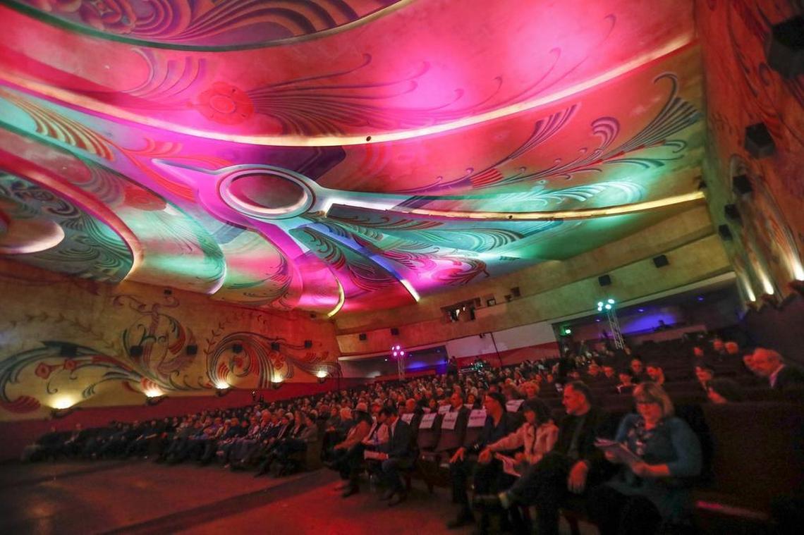 Audience members watch a video reel featuring clips from actress Pam Grier's movies on March 17, 2018, at the Fremont Theater in San Luis Obispo during the San Luis Obispo International Film Festival.