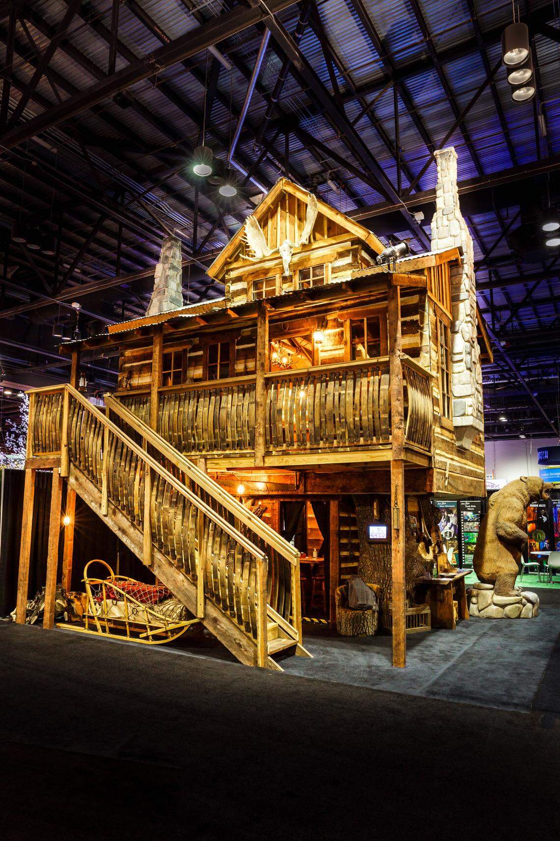 Daniels Wood Land in Paso Robles exhibits a trapper-style cabin at the IAAPA Attractions Expo in Orlando, Florida, in 2014. Company co-founders John and Ron Daniels star in "Cabin Brothers," premiering May 16, 2018, on DIY Network.