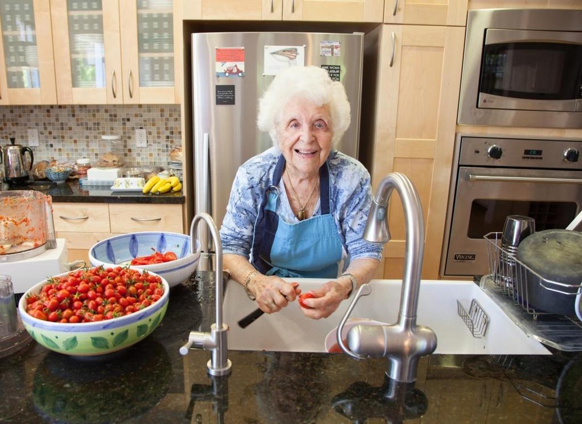 Evelyn Ricciuti appears in a scene from the documentary “Lives Well Lived: Celebrating the Secrets, Wit & Wisdom of Age,” which begins its theatrical run Friday at the Palm Theatre in San Luis Obispo. Her granddaughter, Sky Bergman, directed the movie.