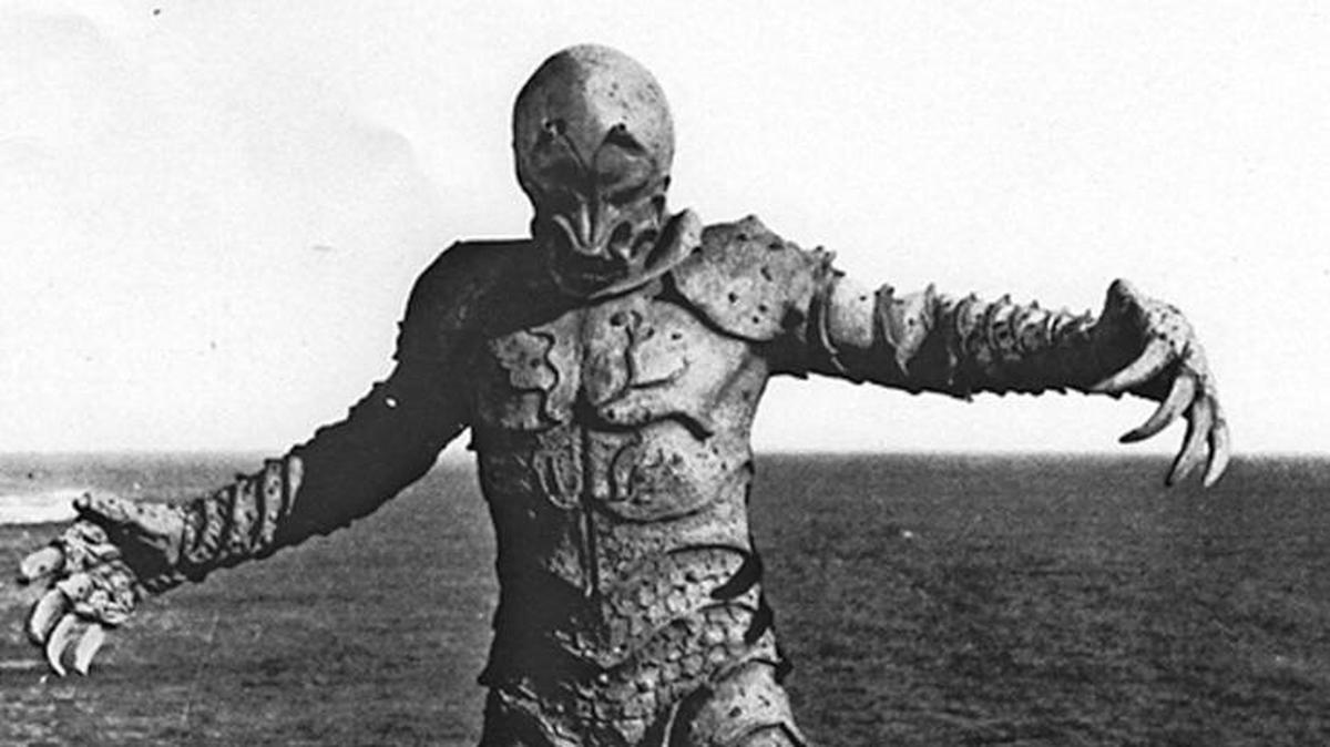A monster menaces a woman in “The Monster of Piedras Blancas,” filmed in Cayucos.