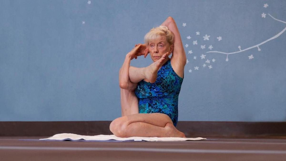 Los Angeles yoga instructor Emmy Cleaves appears in a scene from the documentary “Lives Well Lived: Celebrating the Secrets, Wit & Wisdom of Age,” which begins its theatrical run Friday at the Palm Theatre in San Luis Obispo.