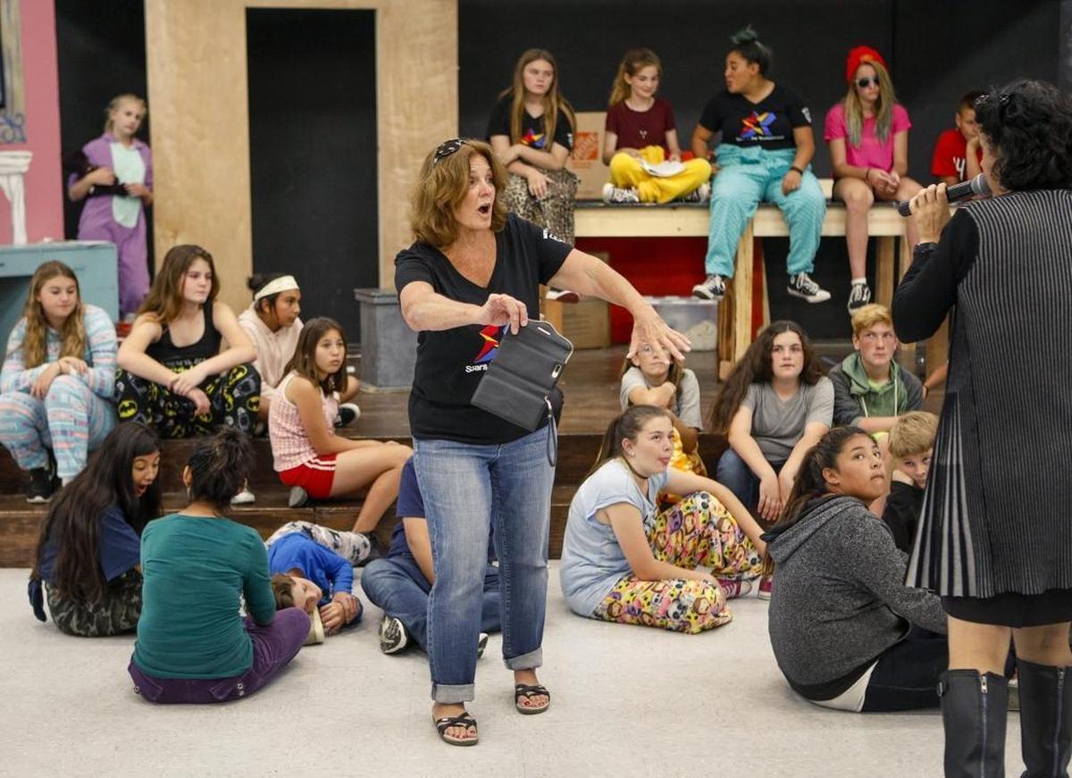 Drama teacher Robyn Metchik directs students at Mesa Middle School in Arroyo Grande as they prepare for their production of "My Little Zombie: A Musical.”