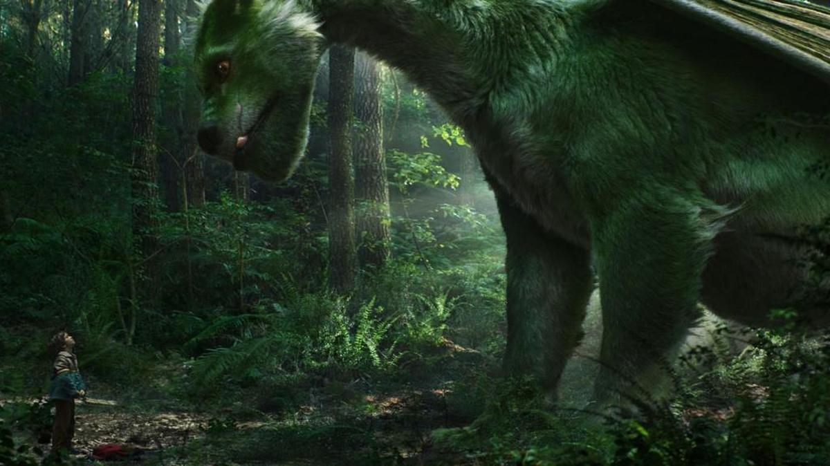 Pete (Oakes Fegley) befriends a furry dragon named Elliott in “Pete’s Dragon.”