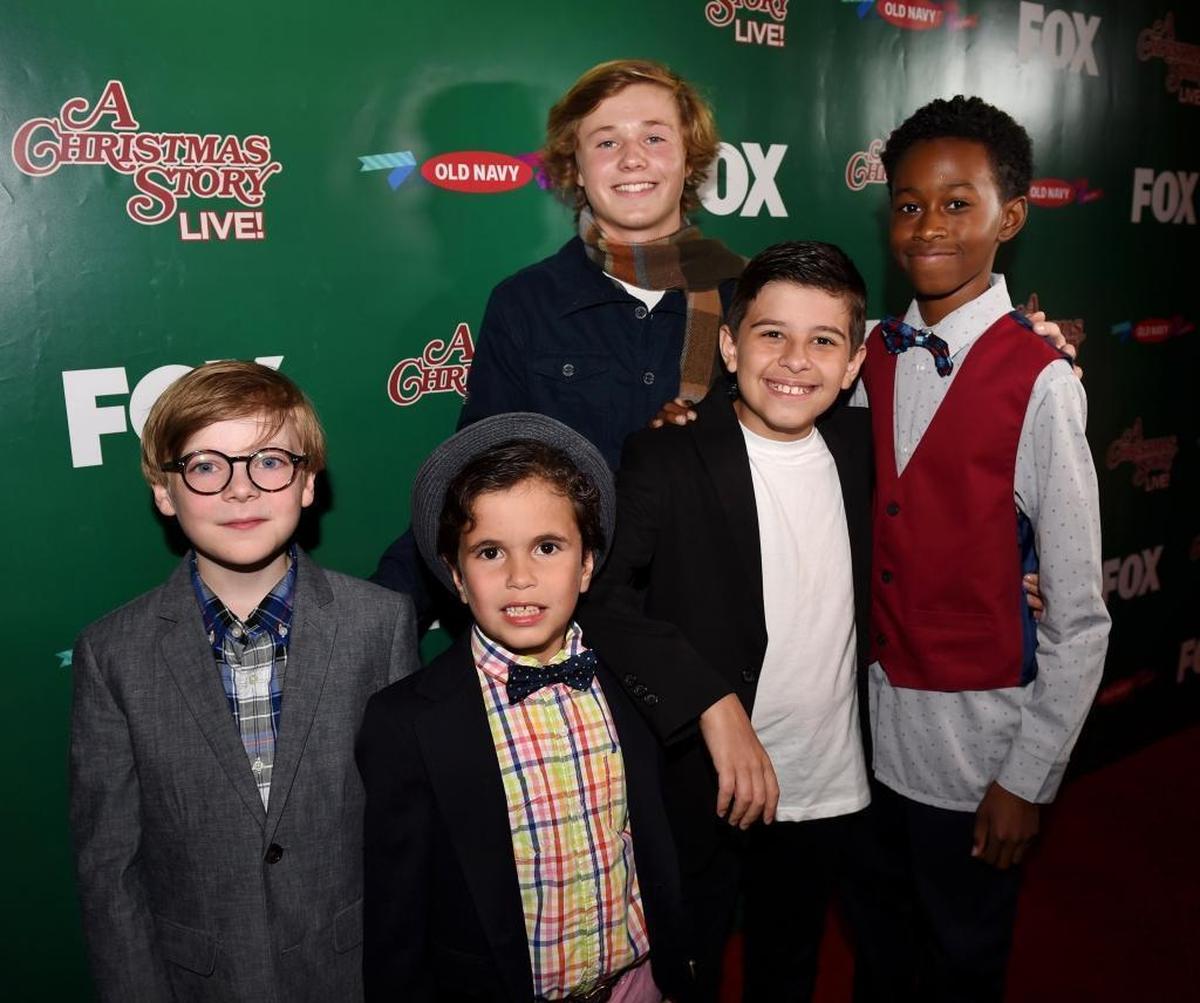Cast members Andy Walken, Tyler Wladis, Sacha Carlson, Sammy Ramirez and JJ Batteast pose for a photo at the “A Christmas Story Live!” Leg Lamp Lighting event at The Grove in Los Angeles on Nov. 24. “A Christmas Story Live!” airs Dec. 17 on Fox.