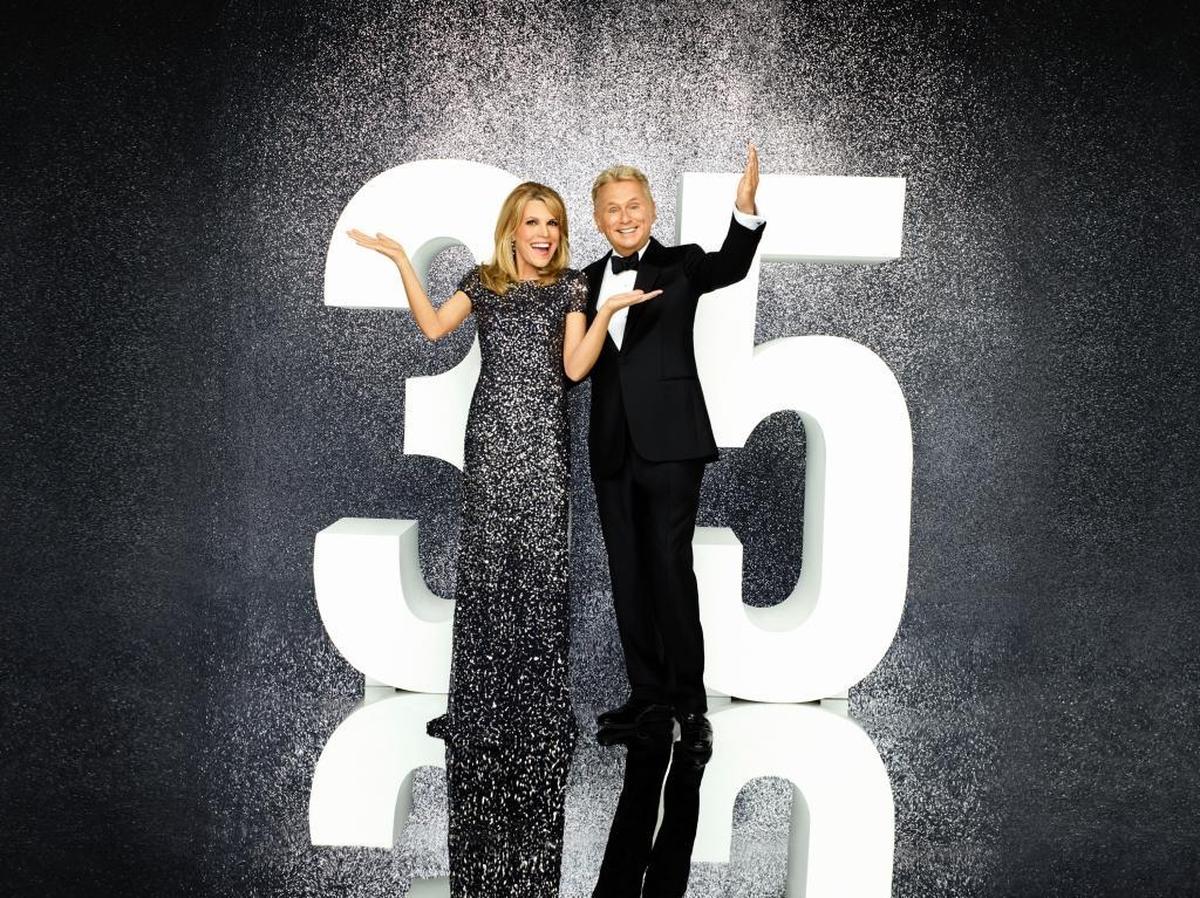 Vanna White and Pat Sajak are the hosts of popular game show “Wheel of Fortune,” which recently celebrated its 35th anniversary.