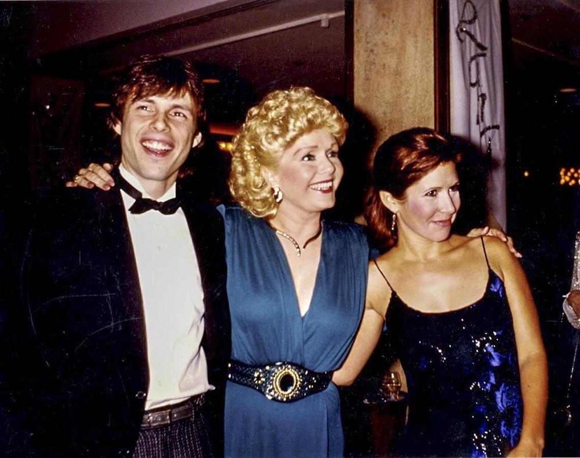 Todd Fisher, Debbie Reynolds and Carrie Fisher pose for a picture in this undated photo. The filmmaker is selling his lavish San Luis Obispo County home.