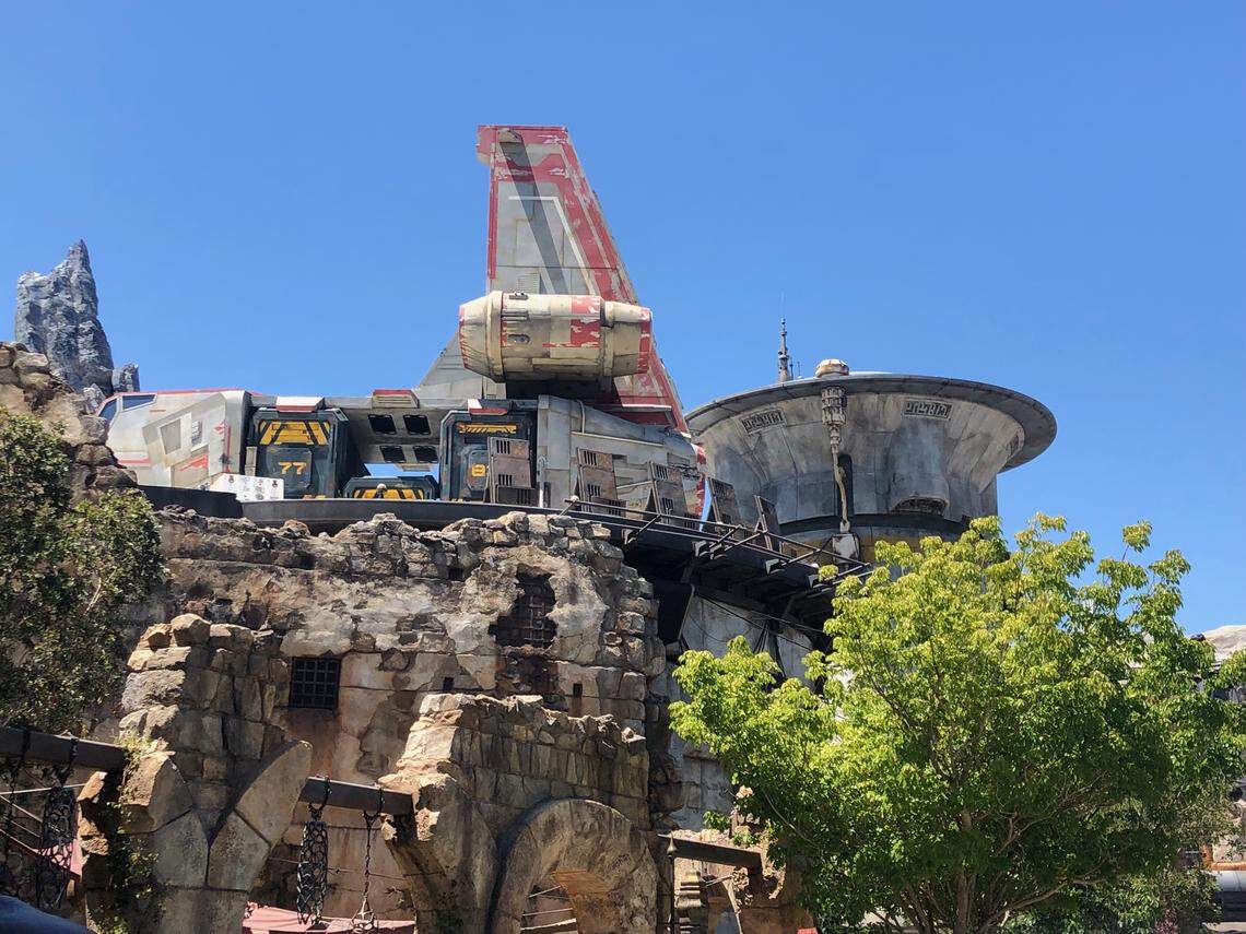 Keep an eye on the skies when wandering around Disneyland’s Star Wars: Galaxy’s Edge and you’ll see the evidence of the Resistance’s fight against the First Order everywhere. The new “Star Wars”-themed land opens Friday at the Anaheim, California, theme park.