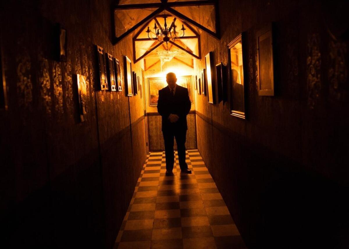 A volunteer actor greets guests to The Haunt in Atascadero. This year, the haunted house has a zombie theme.