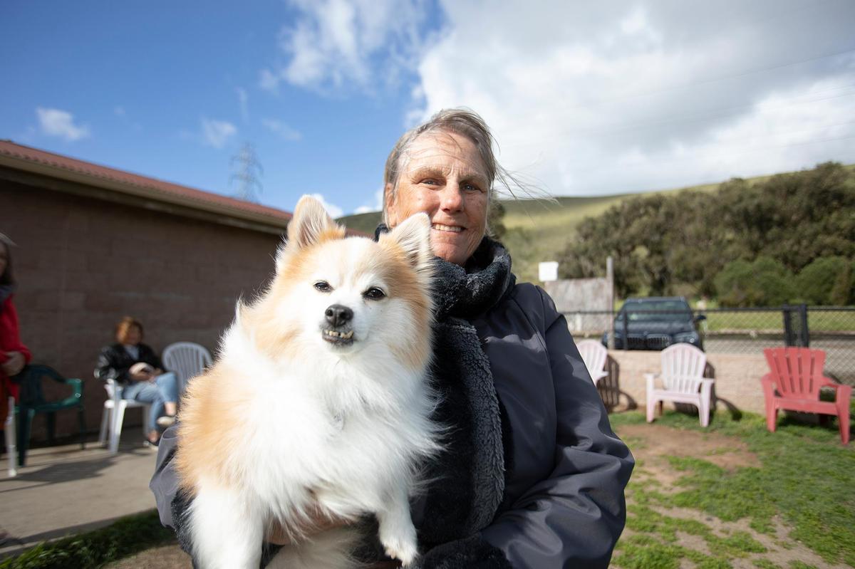 The San Luis Obispo City Council approved spending up to $1.13 million to fix up Laguna Lake Dog Park. The off-leash park needs stump removals and fencing. Kathy Kimball, San Luis Obispo, says she’s excited for the new proposed improvement. She holds her dog Max.