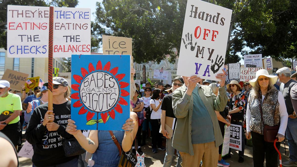 Thousands of people gather at San Luis Obispo Superior Court in California as part of the “Hands Off!” rally to protest President Donald Trump and his advisor Elon Musk.