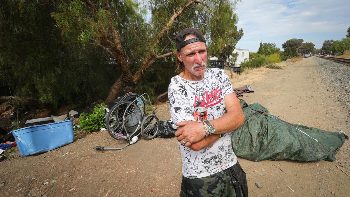 “Duff” has spent time at the county’s safe parking site, at Kansas and Oklahoma Ave., but he since moved to a spot in town along the railroad tracks. San Luis Obispo cleared a homeless camp along the Union Pacific Railroad tracks north of Pepper Street on Aug. 4, 2022.