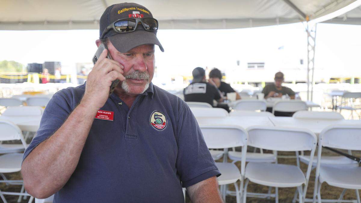 Incident Management Team 5 Logistics Section Chief Ken Kumpe fields a call on Aug. 7, 2025. He helped set up the Santa Margarita Fire Camp, which was designed to support firefighters battling the Gifford Fire.