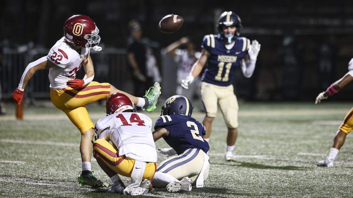 Joe Villa blocks a point after attempt by Elijah Solorio. Mission Prep beat Oxnard 22-19 in the first football game of the season on Aug. 22, 2025.