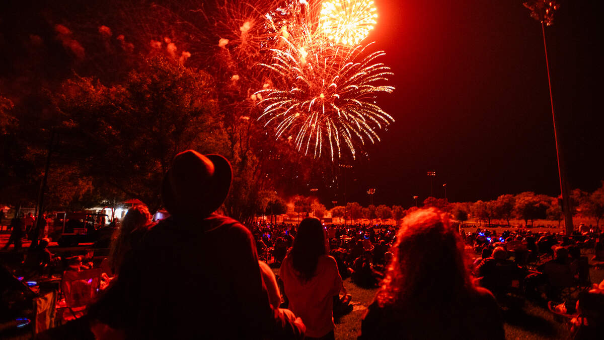 Attendees of Paso Robles’ annual Fourth of July celebration at Barney Schwartz Park watch the fireworks show on July 4, 2026.