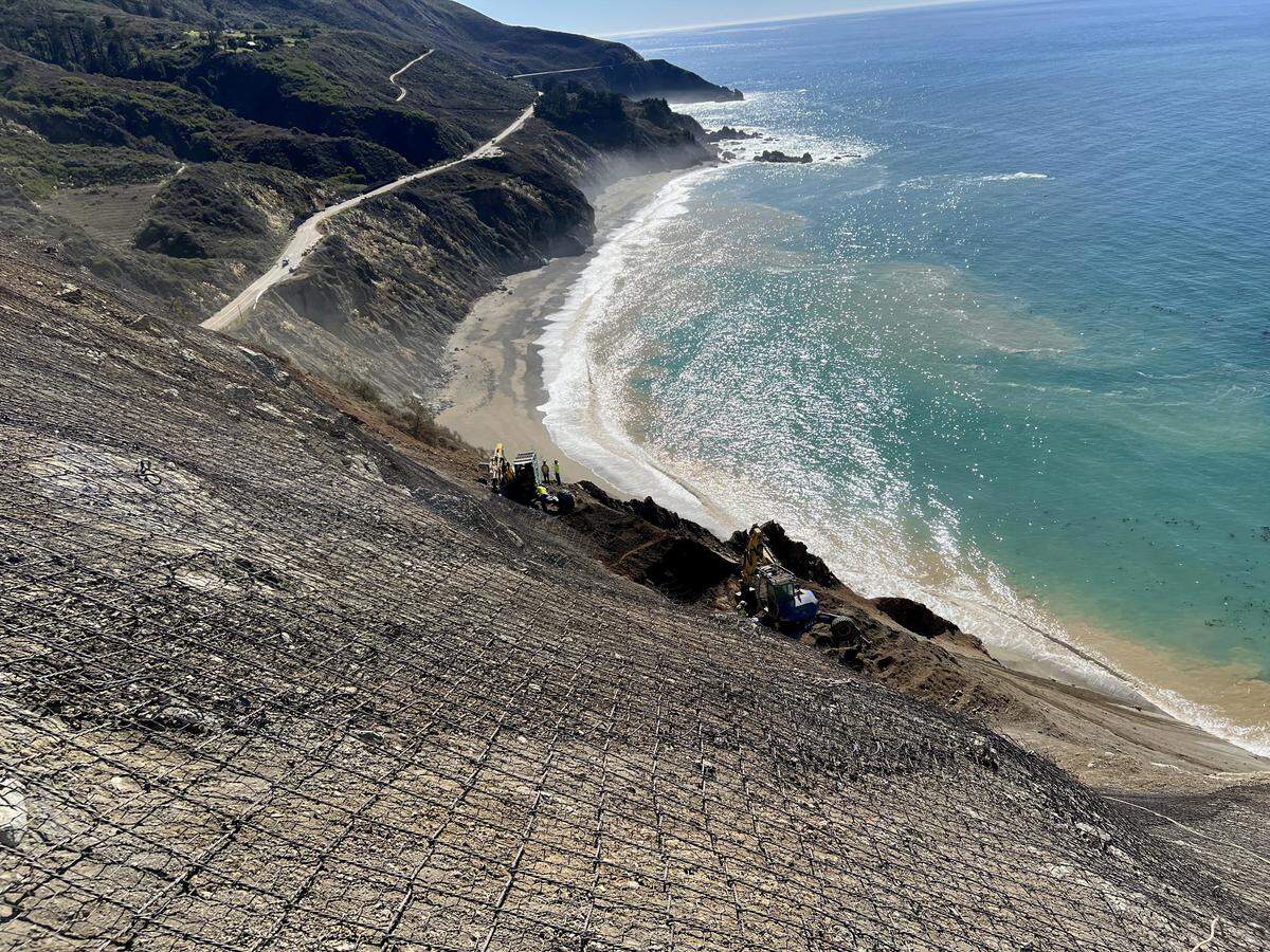 Cable-net drapery stabilizes the troublesome hillside at Regent’s Slide on Highway 1 in Big Sur in December 2025. The drapery system is designed to contain and control rockfalls.