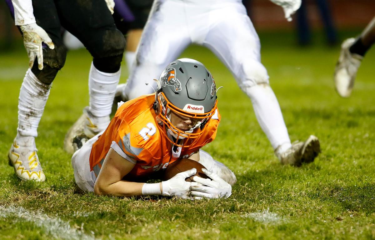 Greyhound Jarom Damery (2) snags a Stallion fumble. Atascadero beat Madera South 39-8 in the second round of the CIF Central Section Division 5 football playoffs on Nov. 10, 2022.