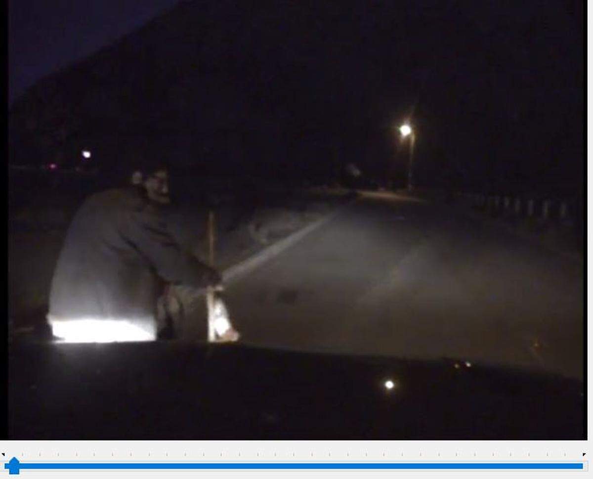 Dash camera footage shows the Oct. 30, 2015, non-fatal shooting of Alec Stephenson by a Morro Bay police officer. Stephenson is seen here riding a bicycle with a stick in his mouth and another in his right hand.