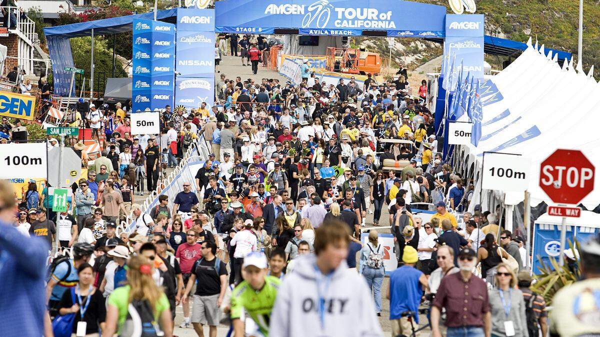 Spectators leave the finish line area after the awards ceremony for Stage 5 of the Tour of California in Avila Beach.