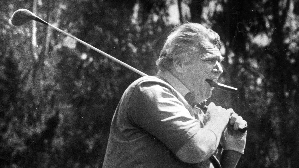 John Madden eyes a shot during his fifth annual golf tournament to benefit Cal Poly football on May 7, 1987. The NFL Hall of Fame coach and Cal Poly alum died on Dec. 28, 2021, at age 85.
