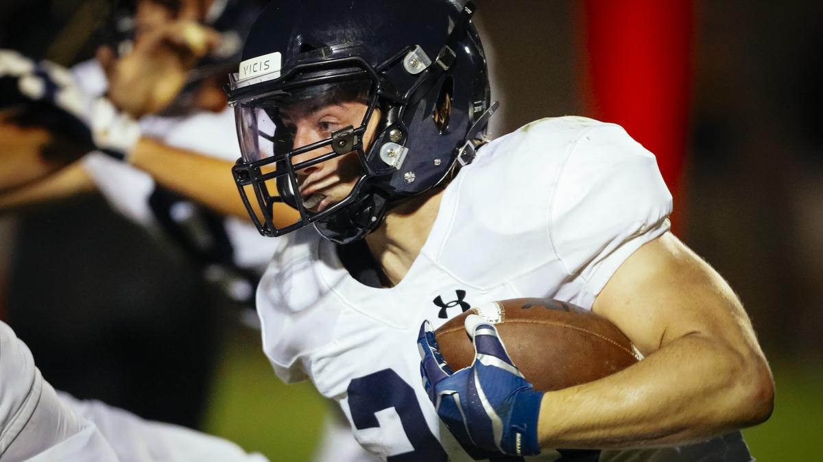 Arroyo Grande High School running back James Gilmet carries the ball in Friday’s non-conference game against San Luis Obispo.