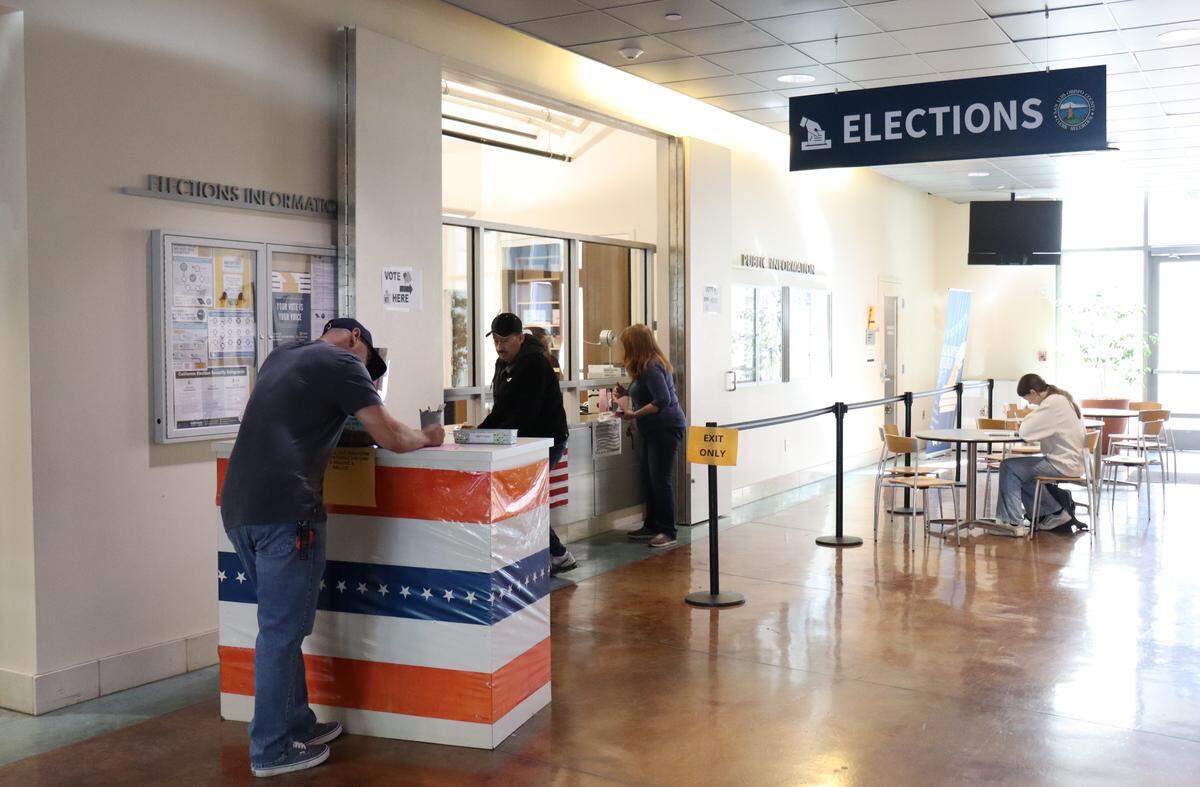 People voting in the statewide special election on Election Day, Nov. 4, 2025, at the San Luis Obispo County election’s office.
