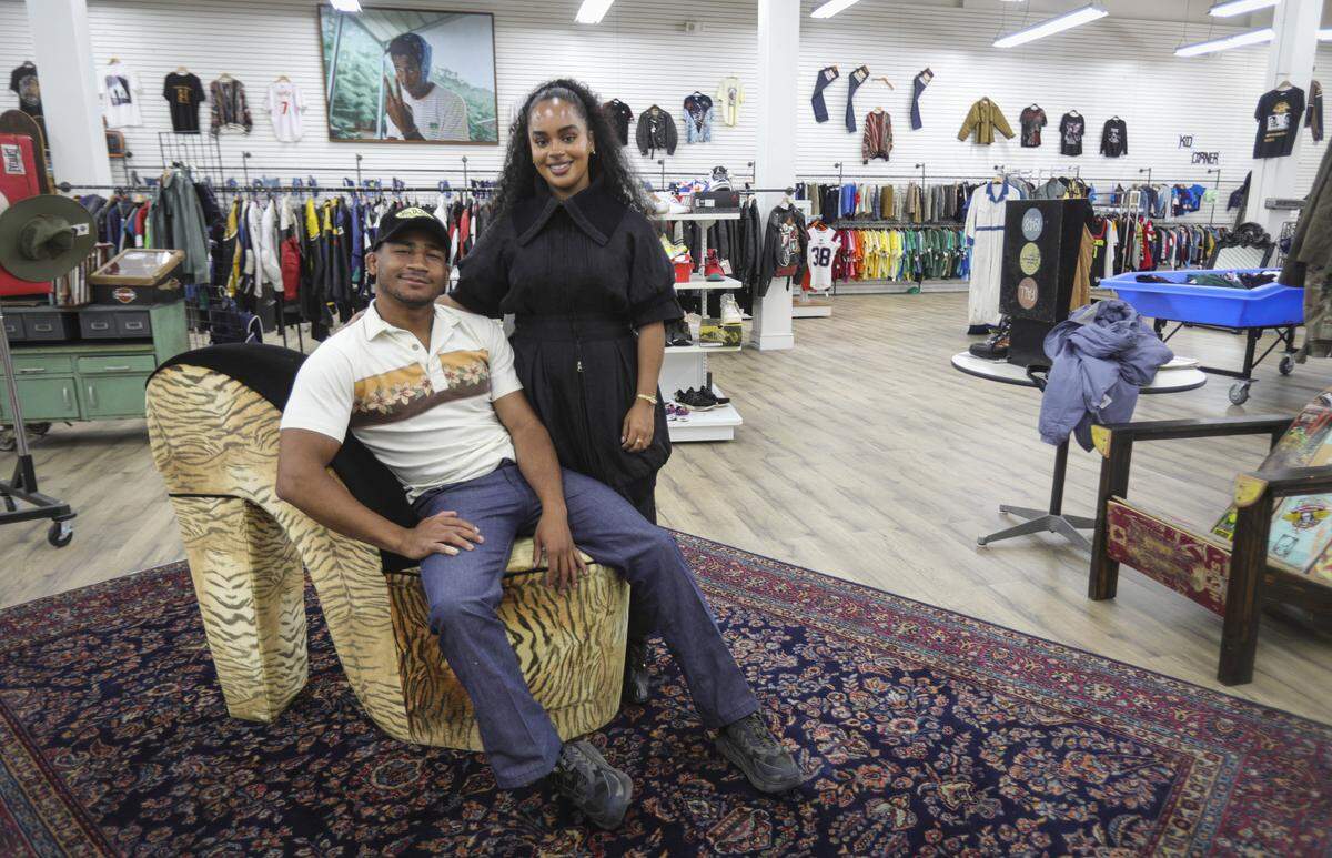 Thrifty Beaches co-owners Adam Kemp and Maria Trott find a new life for clothing and furnishings on Sept. 16, 2025.