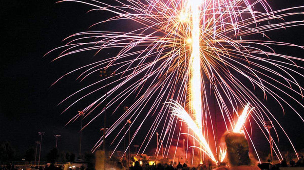 Families watch the fireworks show at Barney Schwartz Park in Paso Robles in 2005.