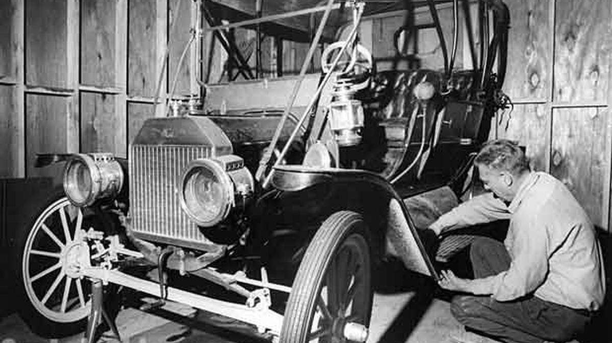 Howard Caccia and his 1909 Model T touring car.