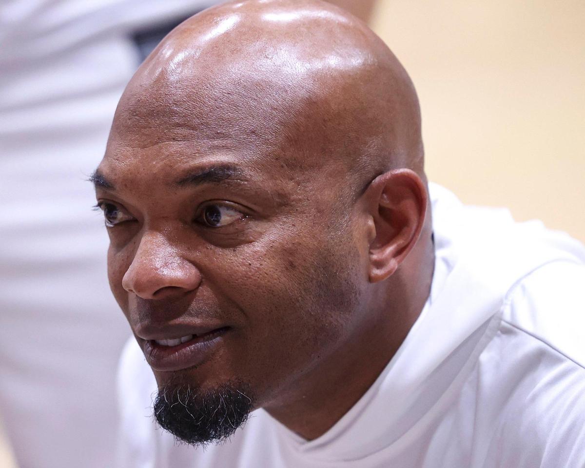 Head Coach Terrance Harris talks to his team during a time-out. Mission Prep beat Venice 70-64 on Feb. 27, 2025 in the first round of the CIF State Championship basketball playoffs.