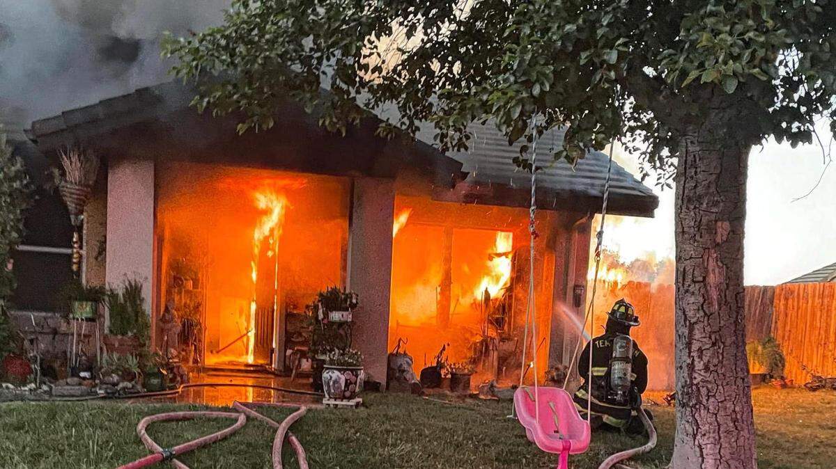 Firefighters respond to a structure fire involving a house on Sunnyside Way in Templeton on Wednesday, May 18, 2022.